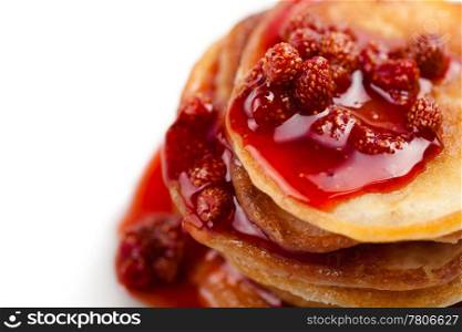 sweet pancakes with strawberry jam isolated