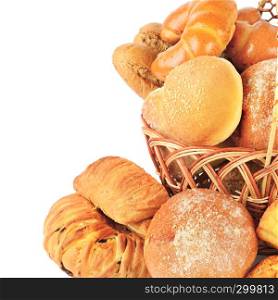 Sweet pastries, bread and flour products in a wicker basket isolated on white background. Free space for text.