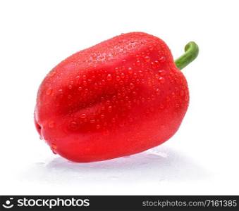 sweet pepper with drops of water isolated on white background.