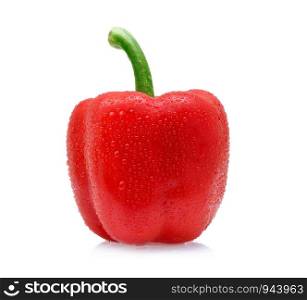 sweet pepper with drops of water on white background.