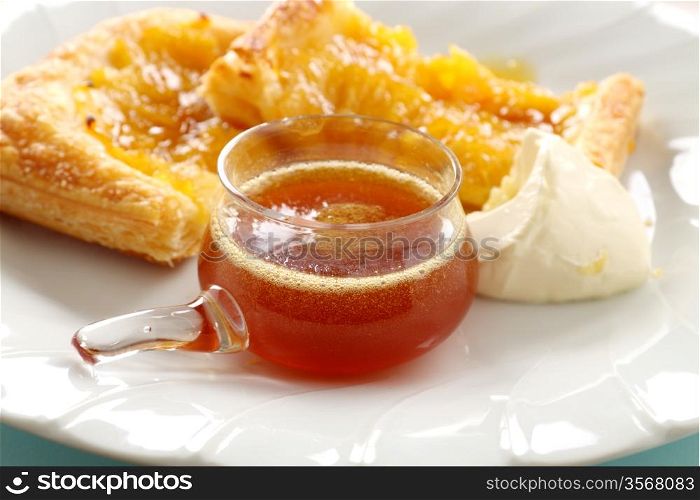 Sweet pineapple syrup with delicious pineapple galettes.