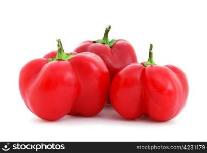 Sweet red peppers isolated on white background . Peppers