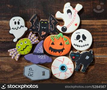 Sweet terror is coming. Funny cookies on a wooden background