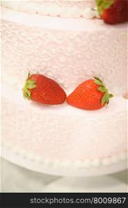 sweet Wedding cake decorated with tasty strawberries