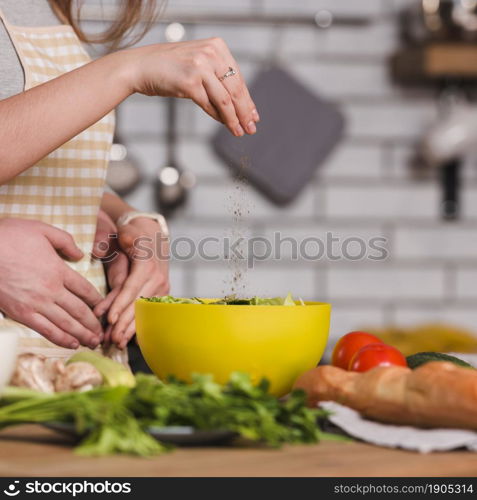 sweethearts preparing vegetable salad kitchen. Beautiful photo. sweethearts preparing vegetable salad kitchen