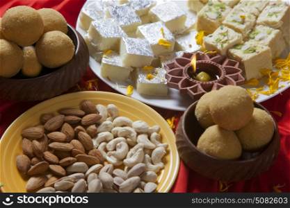 Sweets and nuts in a plate