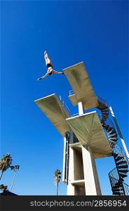 Swimmer diving from diving board