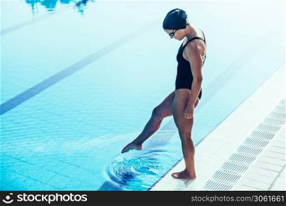 Swimmer on poolside