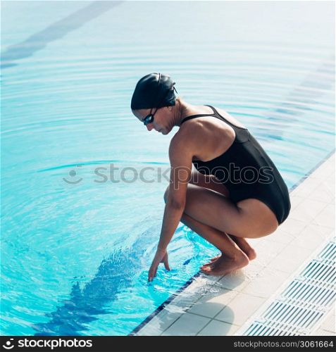 Swimmer on poolside