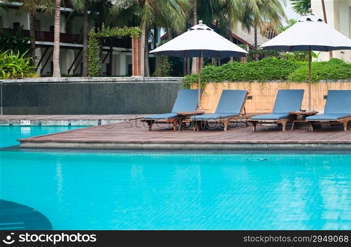 swimming pool and chairs
