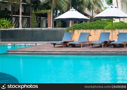 swimming pool and chairs