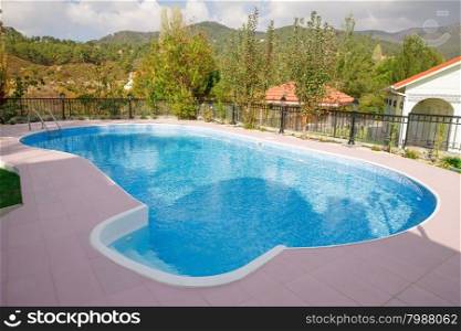 Swimming pool at holiday villa in Cyprus.
