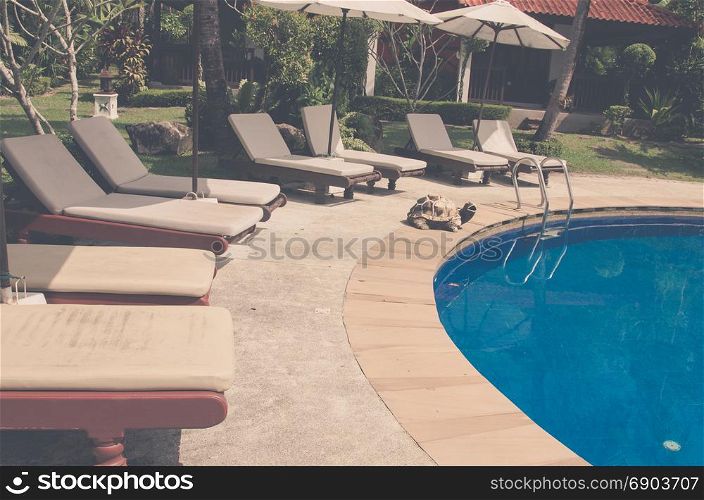 Swimming pool beautiful in tropical resort - Vintage tone.