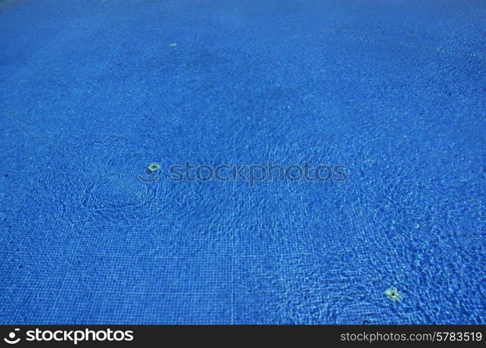 swimming pool blue water detail with textures