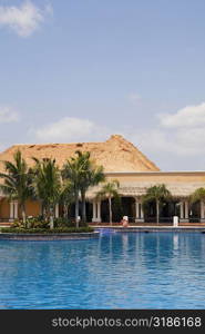 Swimming pool in front of a tourist resort, Cancun, Mexico