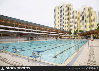 Swimming pool in front of buildings, Clementi Swimming Complex, Clementi, Singapore