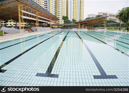 Swimming pool in front of buildings, Clementi Swimming Complex, Clementi, Singapore