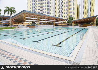 Swimming pool in front of buildings, Clementi Swimming Complex, Clementi, Singapore