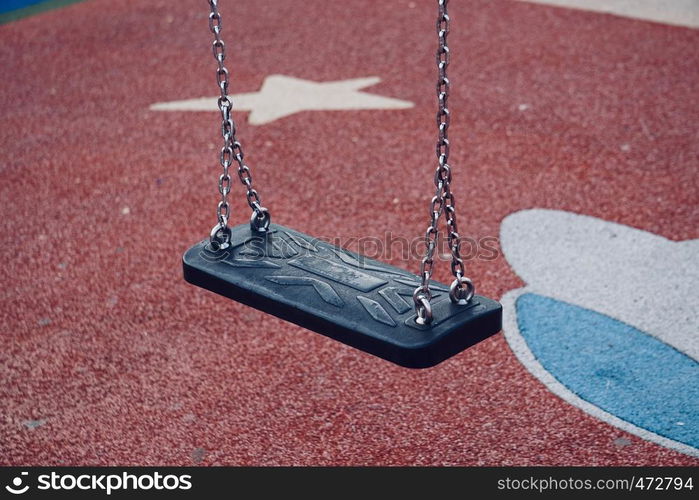 swing in the playground in the street