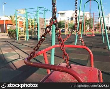 Swings on outdoor playground. Close up. Adler city, Russia