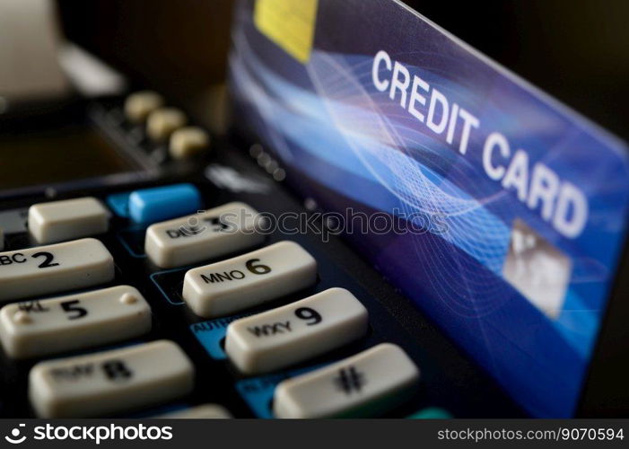 Swipe credit cards in stores to pay for goods and services.