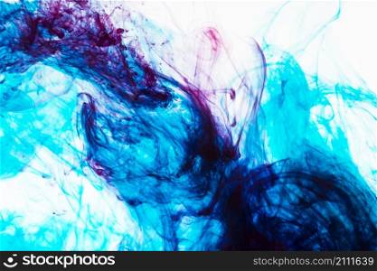 swirls inks mixing underwater
