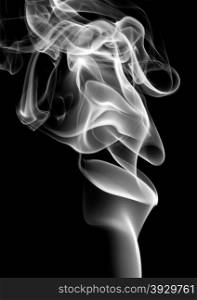 Swirls of cigarette smoke