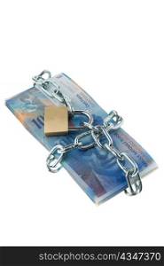 swiss franc notes with lock and chain. money stack for safety and investment.