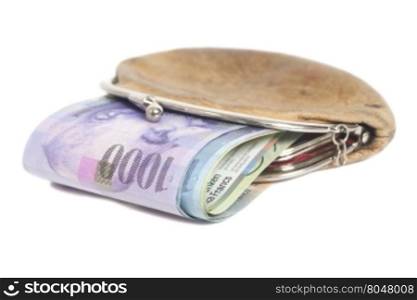 Swiss francs in wallet isolated on white