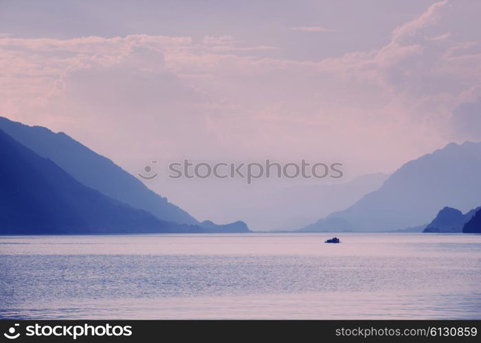 swiss lake at sunset in brienz, switzerland