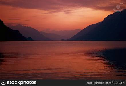 swiss lake at sunset in brienz, Switzerland. swiss lake sunset