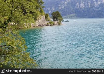swiss lake near interlaken with boats