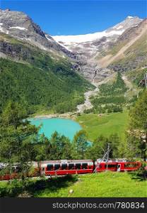 Swiss mountain train Bernina Express crossed Alps with glaciers in the summer