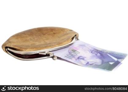 Swiss one thousand francs in wallet isolated on white