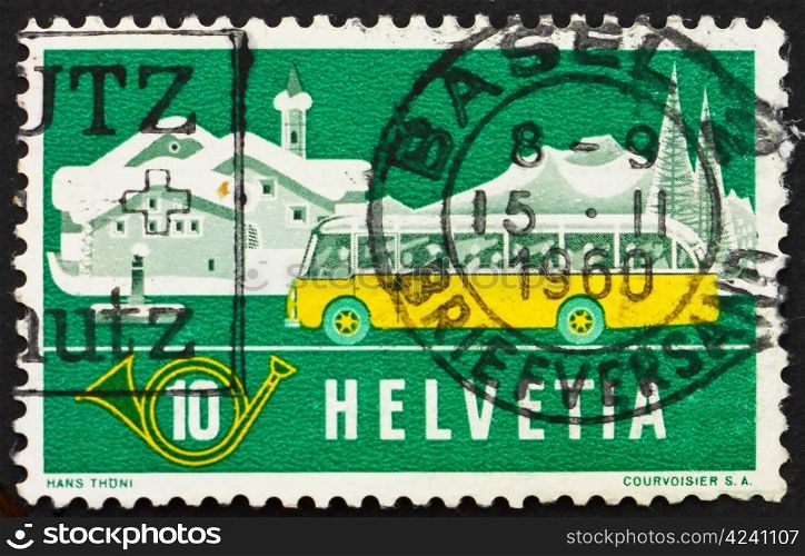 SWITZERLAND - CIRCA 1953: a stamp printed in the Switzerland shows Alpine Post Bus, Winter Background, circa 1953