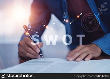 SWOT analysis concept, businessman drawing swot analysis strategy for business plan and growth