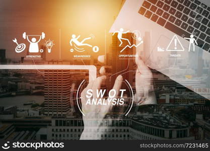 SWOT Analysis virtual diagram with Strengths, weaknesses, threats and opportunities of company.cyber security internet and networking concept.Businessman hand working with VR screen padlock icon mobile phone.