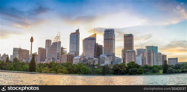 SYDNEY - OCTOBER 2015: Beautiful city skyline at dusk. Sydney at. SYDNEY - OCTOBER 2015: Beautiful city skyline at dusk. Sydney attracts 20 million people annually.