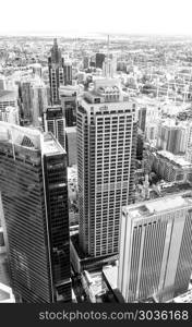 SYDNEY - OCTOBER 2015: Sydney skyline on a beautiful day. The ci. SYDNEY - OCTOBER 2015: Sydney skyline on a beautiful day. The city attracts 10 million people annually.