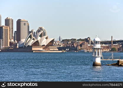 Sydney Opera House in Australia With the City. Sydney Opera House in Australia With the City Center in the Background and a Ferry Port