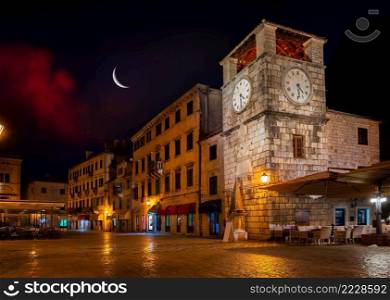 Symbol of the old town of Kotor Clock tower at night