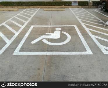 symbol or icon on car park for disabled in public.