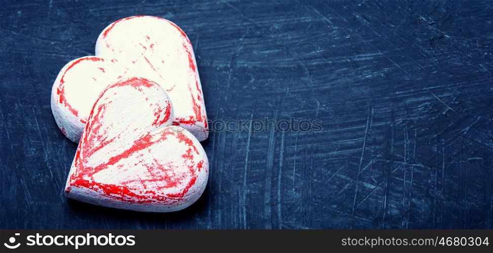 Symbolic hearts for Valentines Day. Symbolic wooden hearts for Valentine Day.Copy space