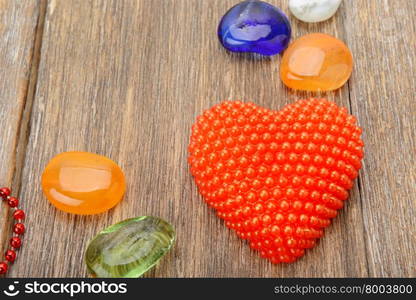 symbolical heart on a wooden surface