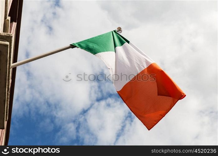 symbolics, patriotism and nationalism concept - close up of irish flag