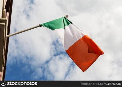 symbolics, patriotism and nationalism concept - close up of irish flag