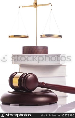Symbols of Justice -Scale, books and Gavel on white