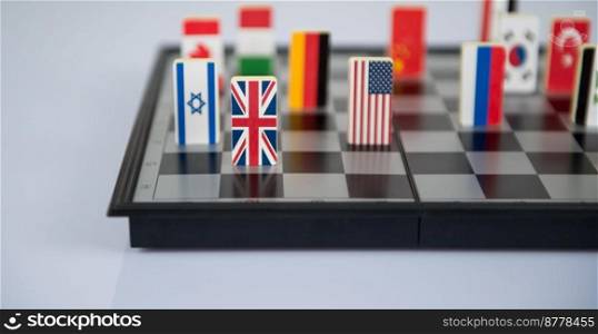 Symbols of the countries on the chess Board. Conceptual photo, political games. . chessboard with flags of countries