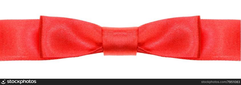 symmetric red bow knot on wide silk ribbon isolated on white background