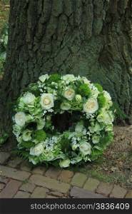 Sympathy wreath near a tree